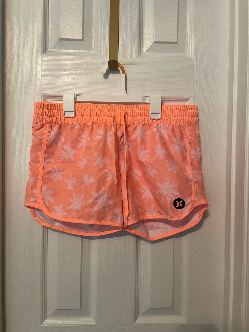 Hurley Women's Beach Break Boardshorts in a coral tropical palm print